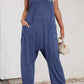 Pocketed V-Neck Spaghetti Strap Jumpsuit