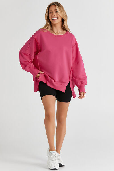 Slit Exposed Seam Round Neck Sweatshirt